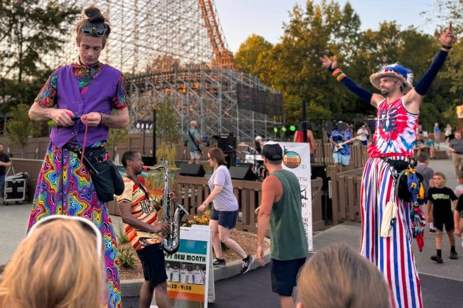 Men on stilts entertain crowds at Holiday World theme park in Santa Claus, Indiana, USA